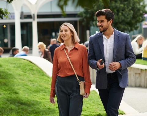 Staff walking outdoors